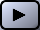 Grey button with a filled black triangle pointing to the right.